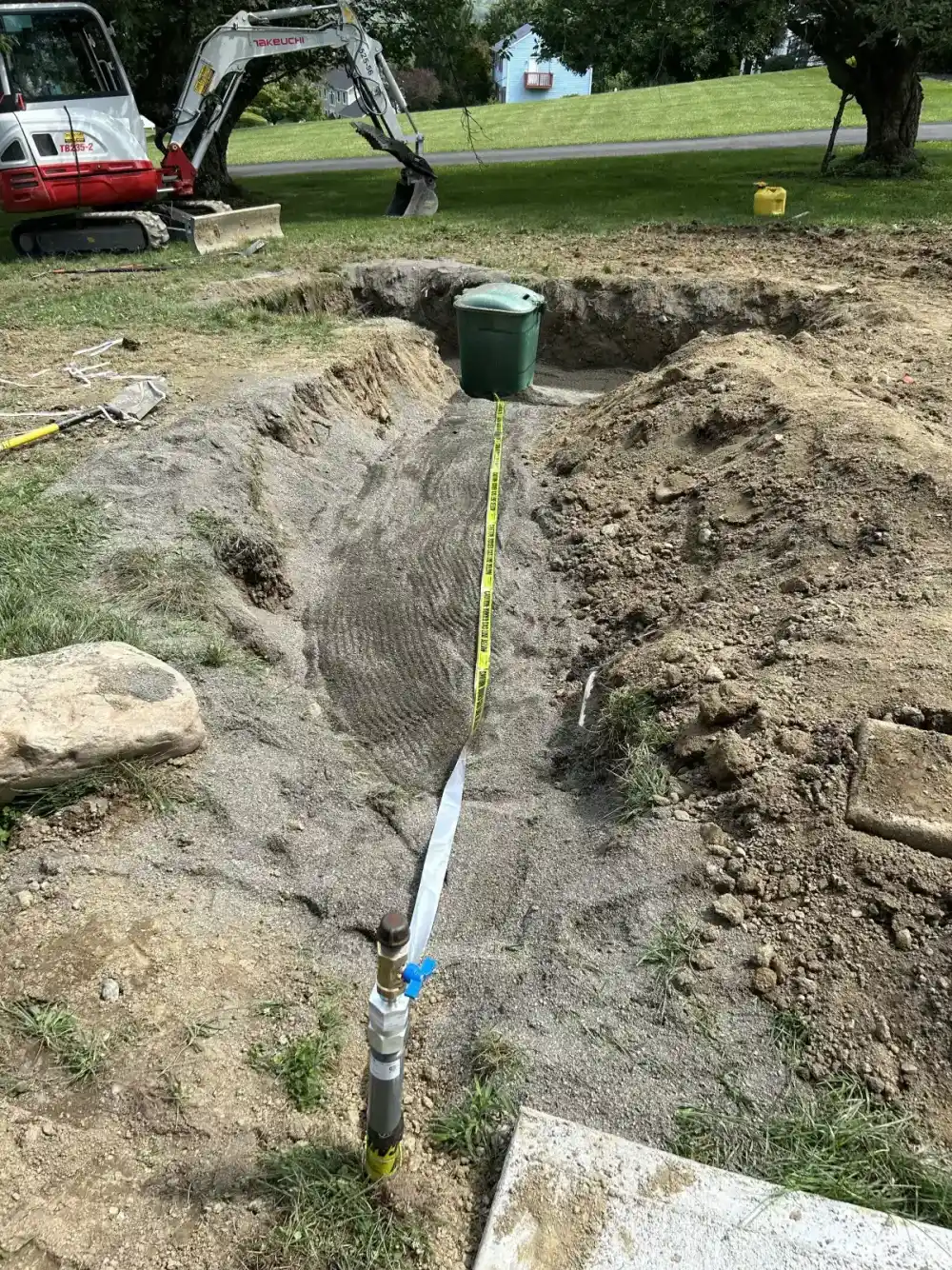 Drainage pipe installation in progress at Dutchess County property