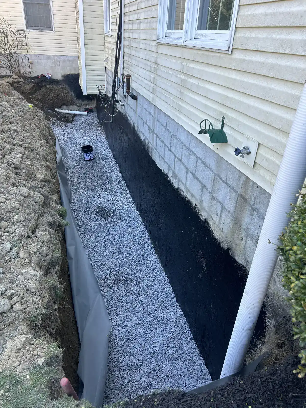 Footing drain installation at foundation in Dutchess County