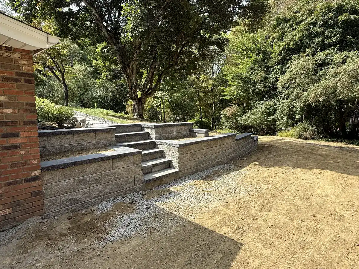 Stone retaining wall with steps in Dutchess County