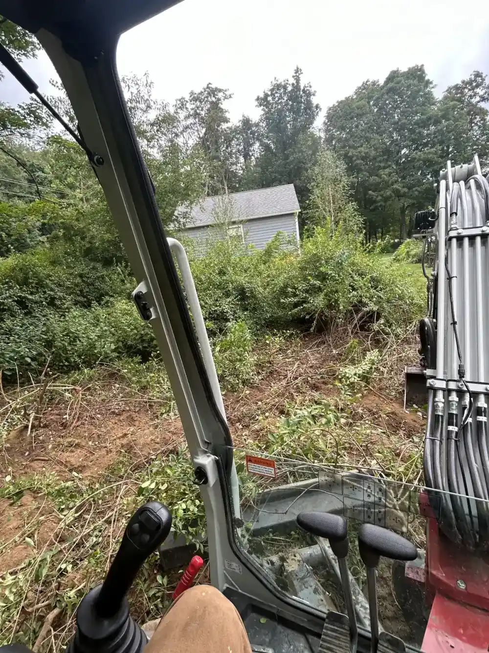 Brush clearing with excavator in Dutchess County