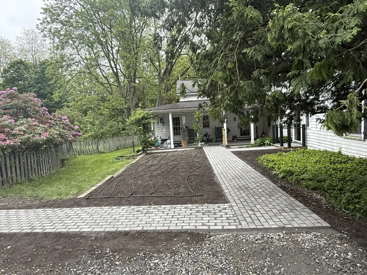 Paver walkway intersection connecting outdoor areas