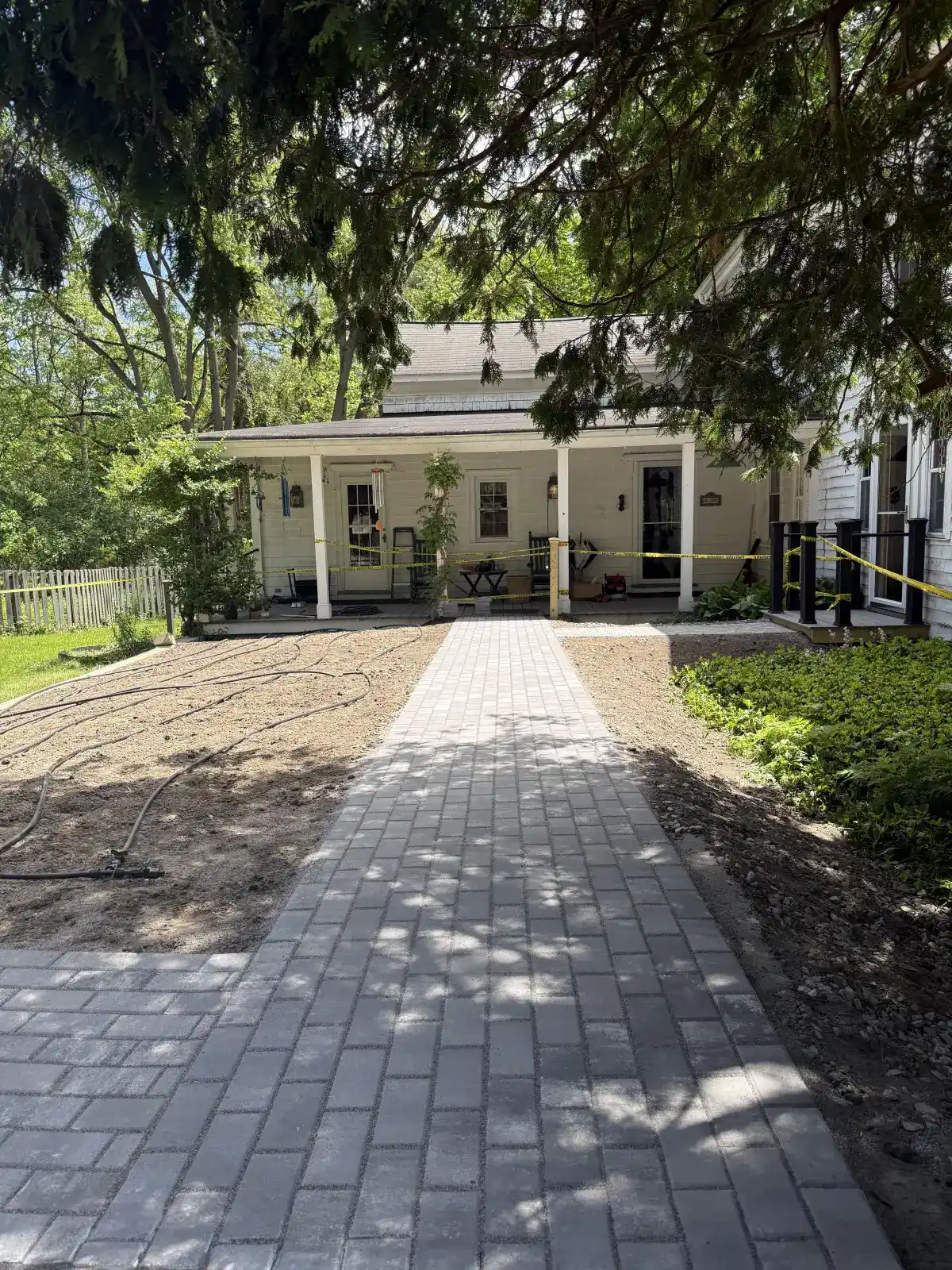 Long retaining wall installed by All American Lawn and Landscape in Dutchess County